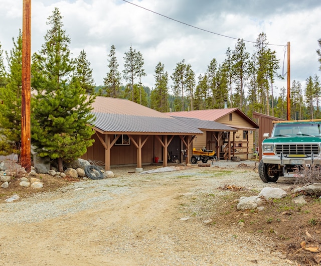 view of front of home with an outdoor structure