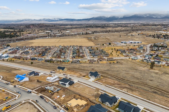 birds eye view of property featuring a mountain view