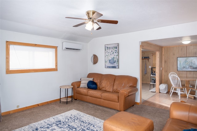 carpeted living room featuring ceiling fan, wooden walls, and a wall mounted AC