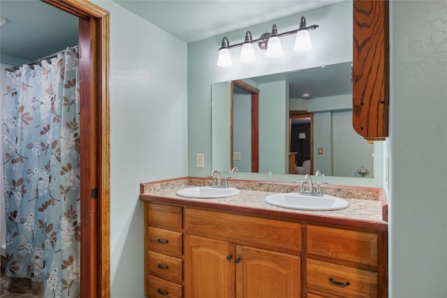 707 W Desta St, Hamilton, MT 59840 - bathroom featuring double sink vanity
