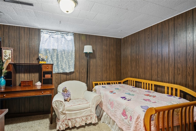707 W Desta St, Hamilton, MT 59840 - carpeted bedroom with wood walls
