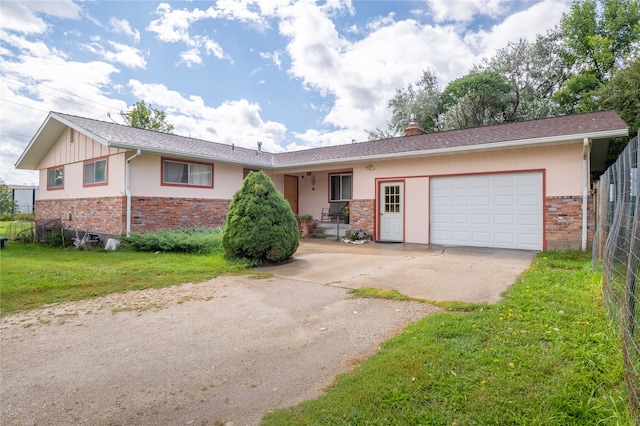 707 W Desta St, Hamilton, MT 59840 - ranch-style home featuring a front yard and a garage
