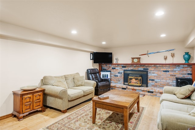 707 W Desta St, Hamilton, MT 59840 - living room featuring light hardwood / wood-style flooring and a fireplace