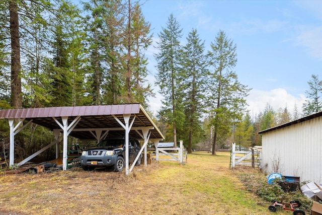 view of yard with a carport