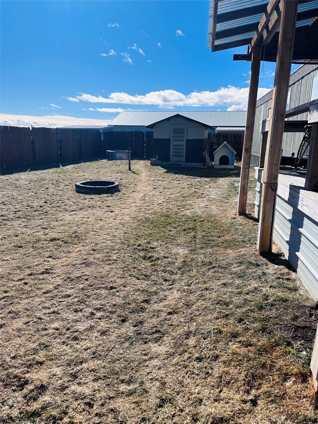 view of yard with a wooden deck