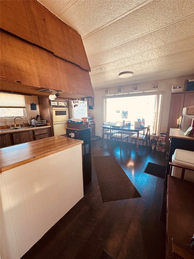 kitchen with sink and multiple ovens