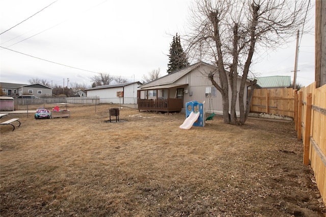 view of yard featuring a wooden deck