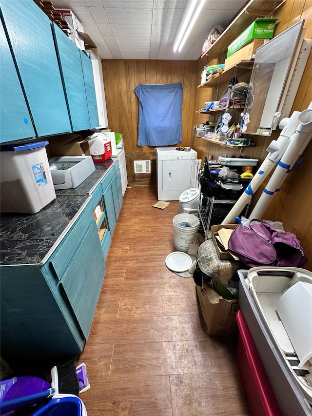 storage area featuring washer and dryer