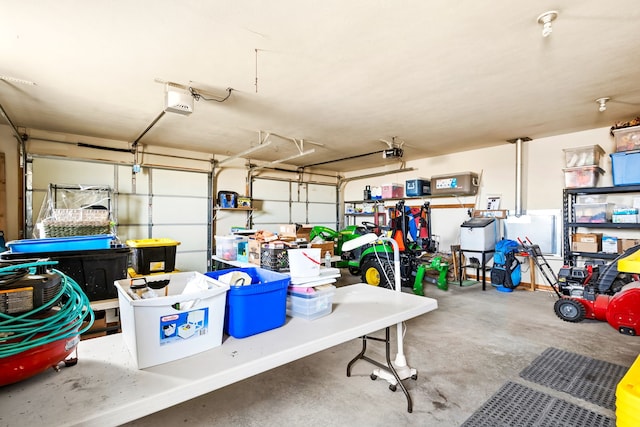 garage featuring a garage door opener