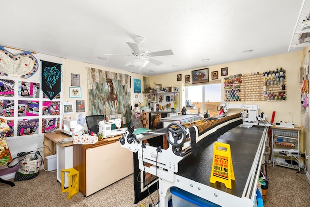 recreation room with carpet and ceiling fan