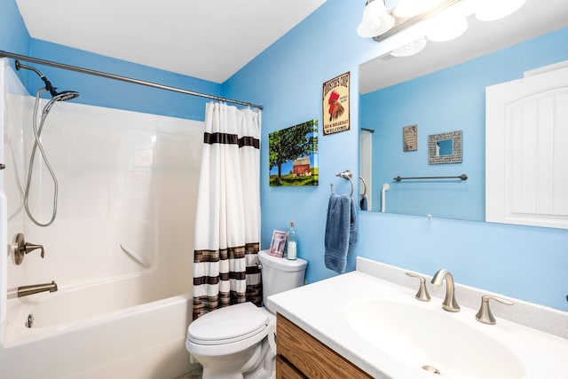 full bathroom with shower / tub combo, vanity, and toilet