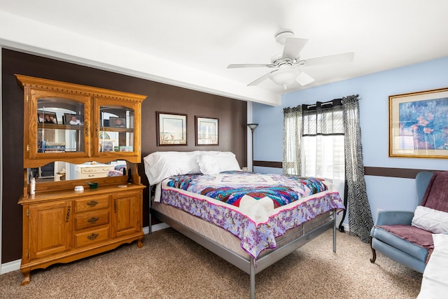 bedroom featuring carpet and ceiling fan