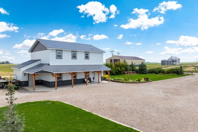 modern inspired farmhouse with covered porch