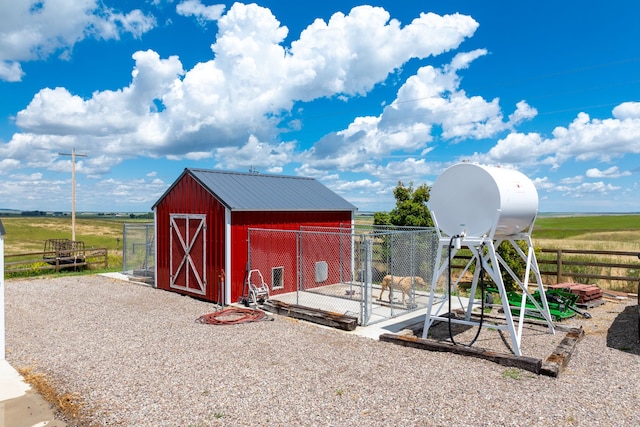 view of outdoor structure featuring a rural view