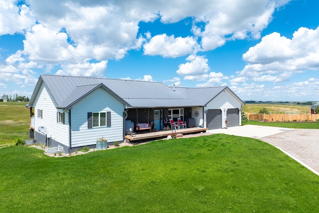 single story home with a front lawn and a garage