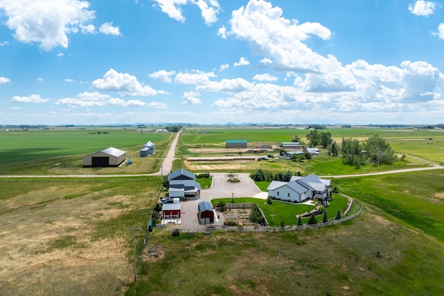 birds eye view of property featuring a rural view