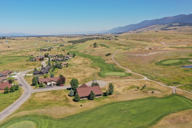 30 Demers Pl, Eureka, MT 59917 - aerial overview of property's location with a mountain backdrop and a local golf course
