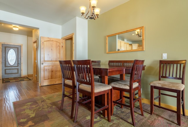 30 Demers Pl, Eureka, MT 59917 - dining area featuring a chandelier and hardwood / wood-style flooring