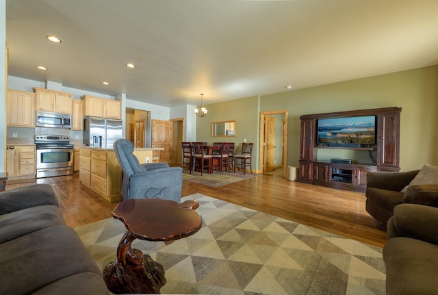 30 Demers Pl, Eureka, MT 59917 - living area featuring a chandelier, wood finished floors, and recessed lighting