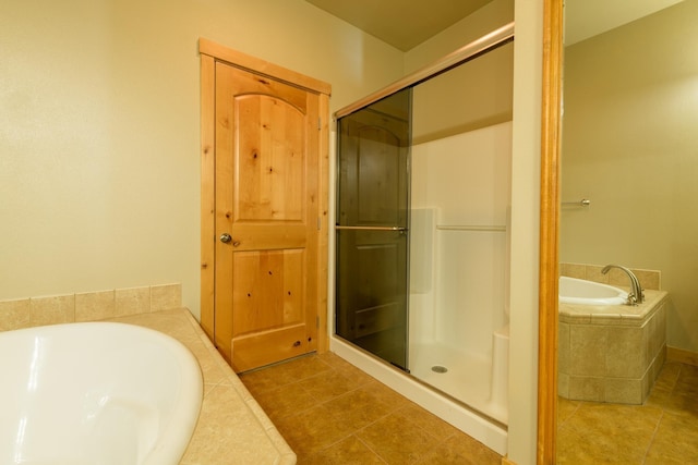 30 Demers Pl, Eureka, MT 59917 - full bathroom featuring a shower stall, a bath, and tile patterned flooring