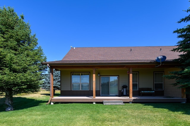 30 Demers Pl, Eureka, MT 59917 - rear view of property featuring a yard and roof with shingles