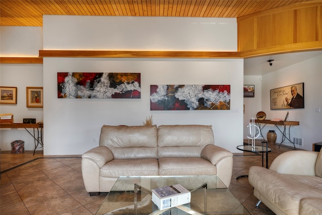 living room with tile patterned floors and wooden ceiling