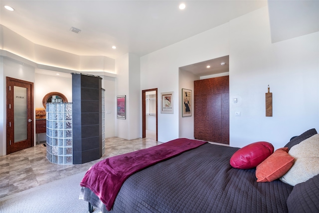 bedroom featuring light tile patterned flooring