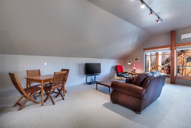 carpeted living room featuring a wall mounted air conditioner, vaulted ceiling, and rail lighting