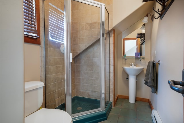 bathroom with toilet, tile patterned flooring, a shower with shower door, sink, and a baseboard radiator