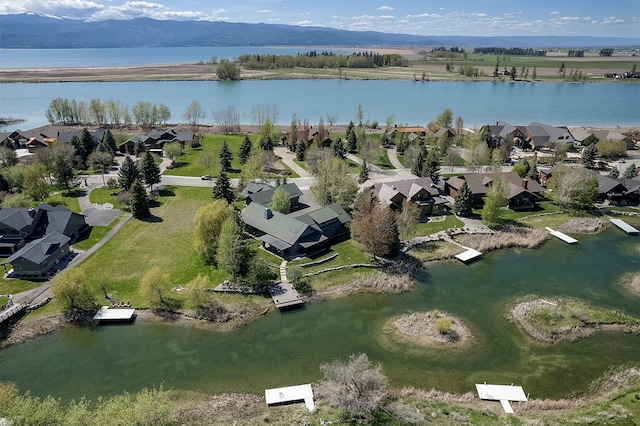 bird's eye view featuring a water and mountain view