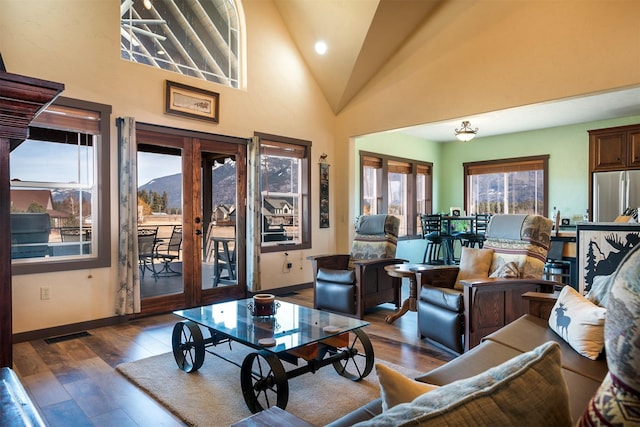 165 Jewel View Dr, Columbia Falls, MT 59912 - living area featuring french doors, hardwood / wood-style flooring, and high vaulted ceiling