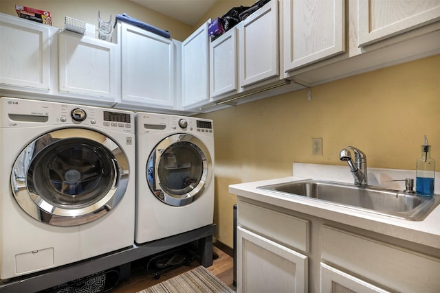 165 Jewel View Dr, Columbia Falls, MT 59912 - laundry room featuring cabinet space and washing machine and dryer