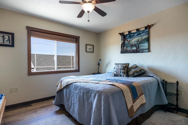 165 Jewel View Dr, Columbia Falls, MT 59912 - bedroom with wood finished floors and a ceiling fan