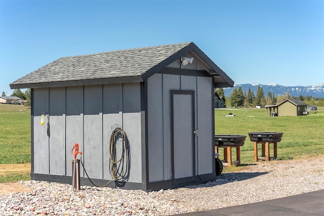 165 Jewel View Dr, Columbia Falls, MT 59912 - view of shed with a mountain view
