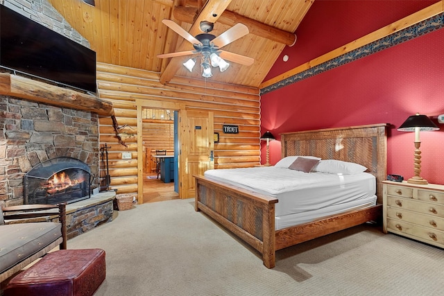 770 Pallo Trl, Hamilton, MT 59840 - carpeted bedroom featuring log walls, a wooden ceiling with exposed beams, high vaulted ceiling, a fireplace, and a ceiling fan
