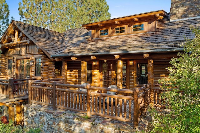770 Pallo Trl, Hamilton, MT 59840 - view of front of house with a chimney and log exterior