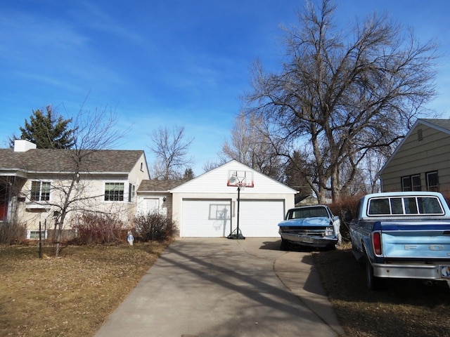 view of side of property featuring a garage