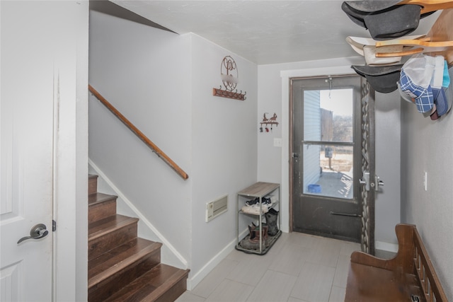 view of tiled entrance foyer