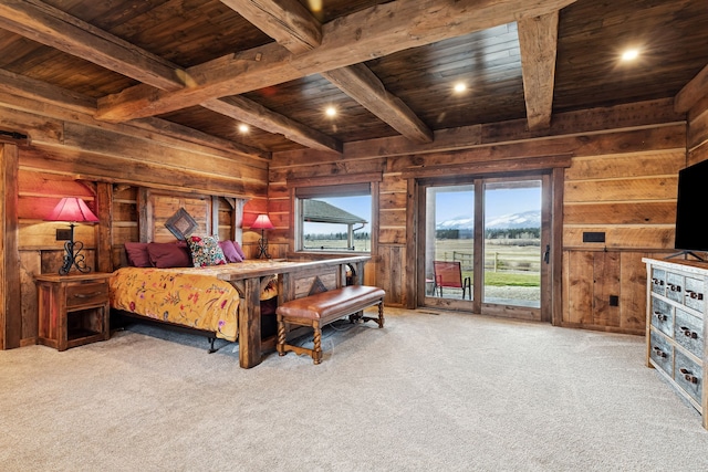 bedroom with carpet floors, wood ceiling, wood walls, and access to outside