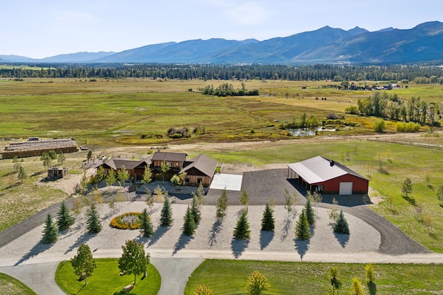 aerial view with a mountain view and a rural view