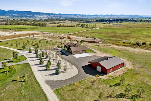 aerial view featuring a rural view and a mountain view