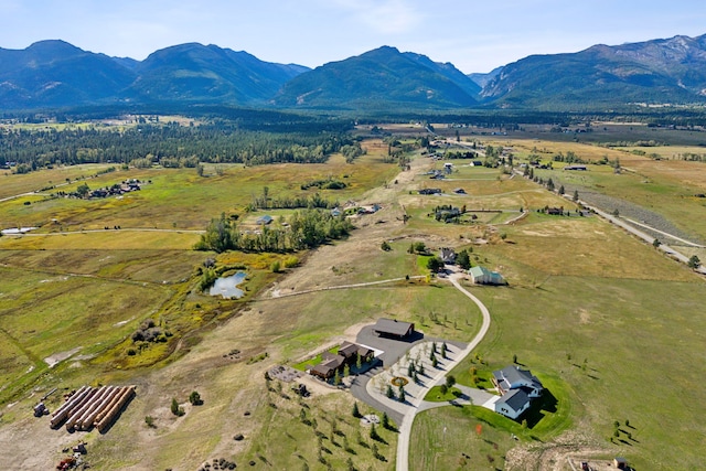 aerial view featuring a mountain view and a rural view