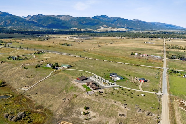 aerial view with a mountain view and a rural view