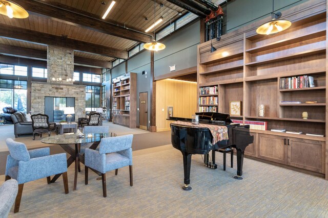 100 Woodlands Way Unit P-204, Kalispell, MT 59901 - interior space featuring beam ceiling, wood ceiling, and a towering ceiling