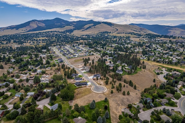 drone / aerial view featuring a mountain view