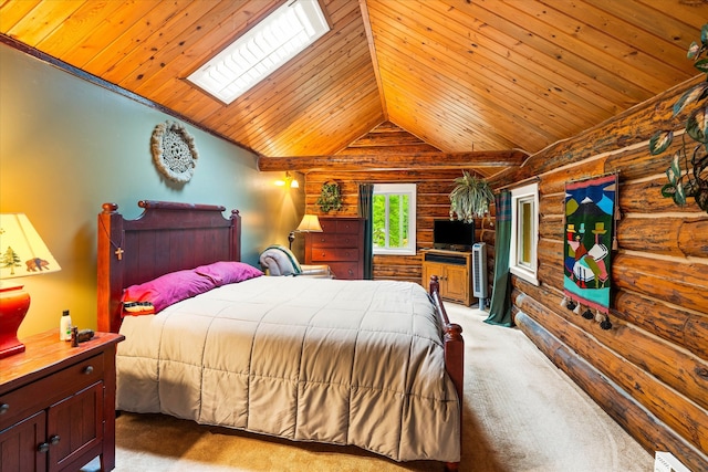 carpeted bedroom featuring lofted ceiling with skylight and wood ceiling