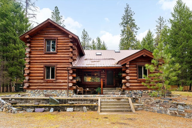 view of log-style house