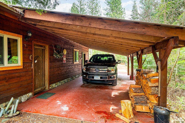 view of parking / parking lot featuring a carport