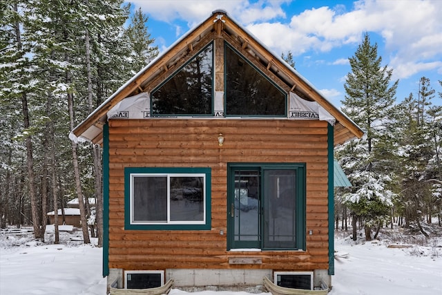 view of snow covered property