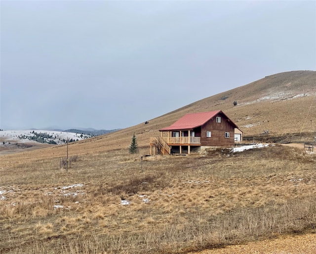 exterior space featuring a mountain view and a rural view